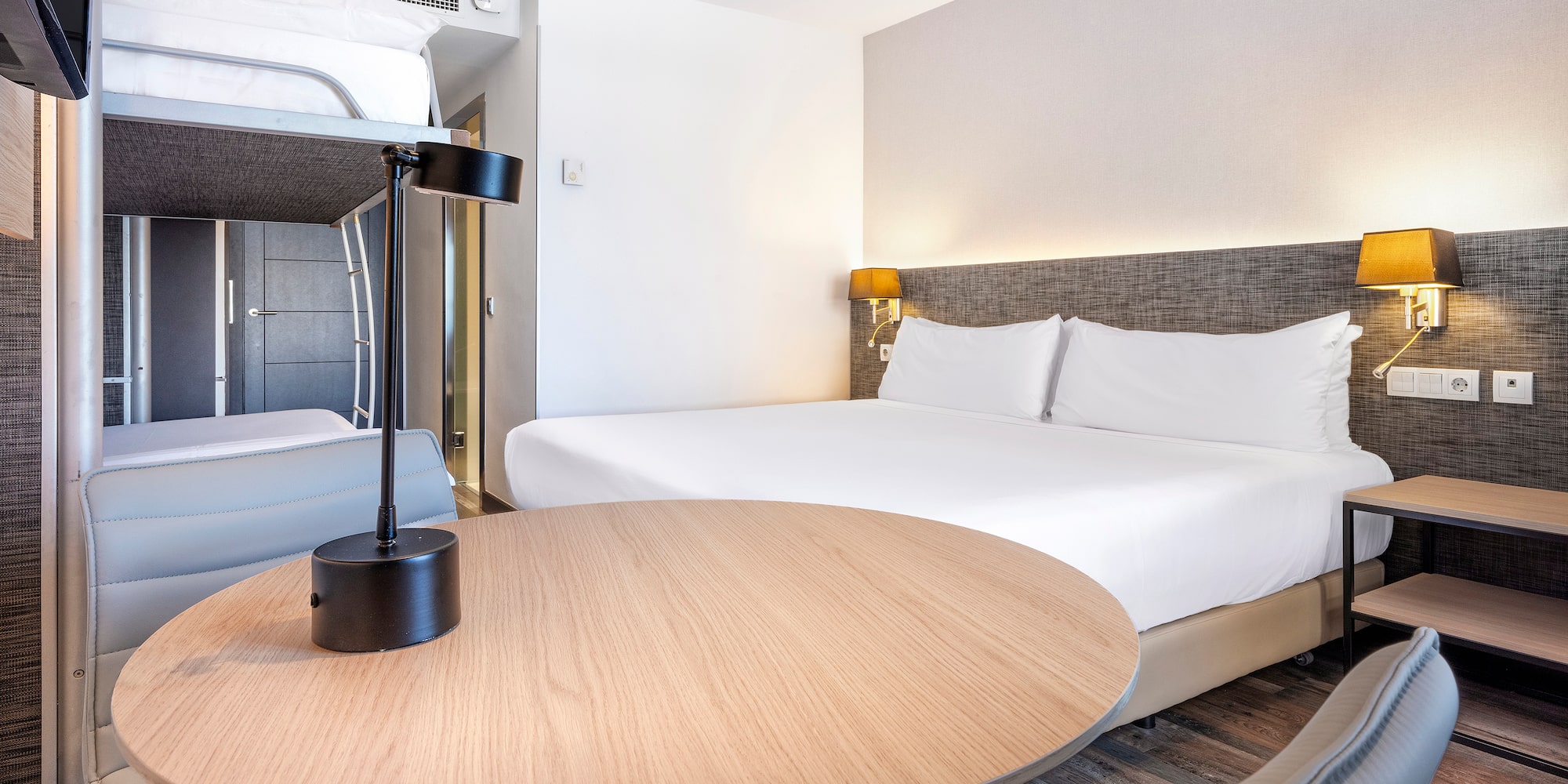 a room with a bed and a table