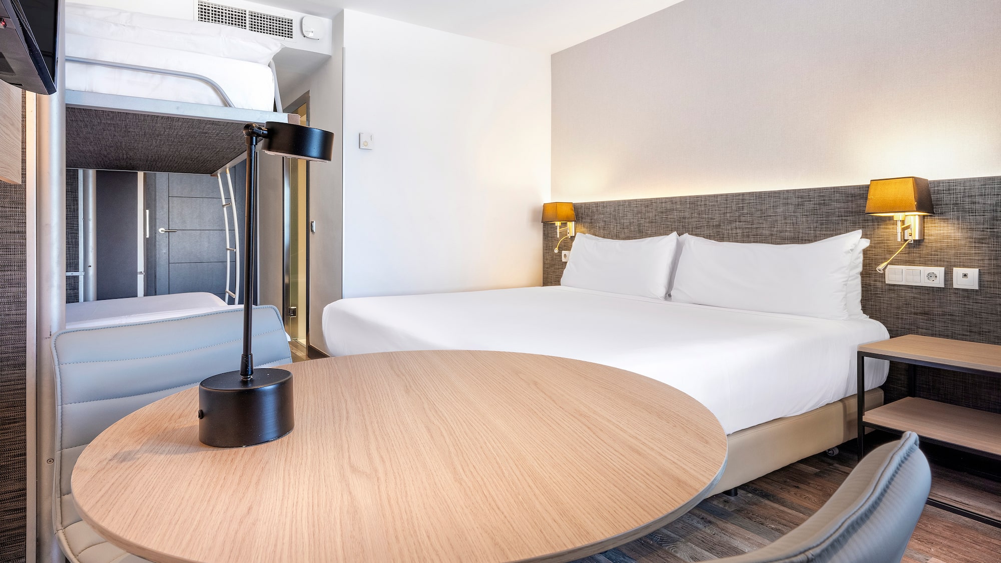 a room with a bed and a table