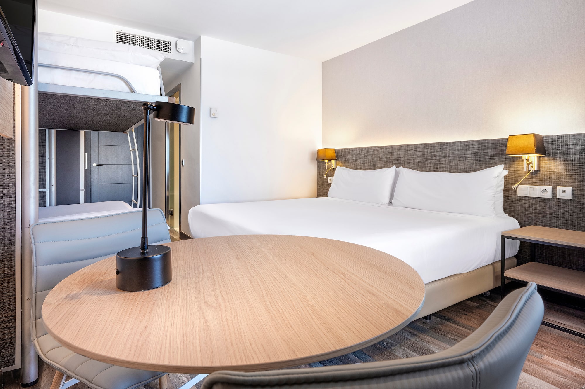 a room with a bed and a table