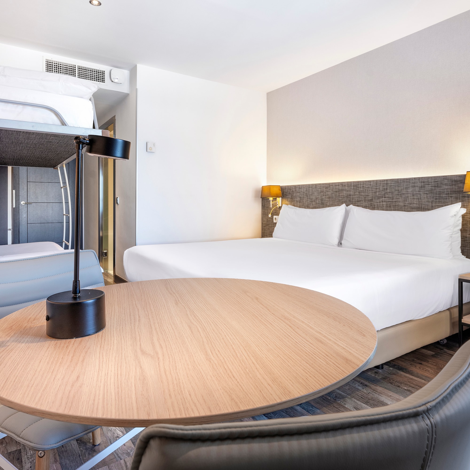 a room with a bed and a table