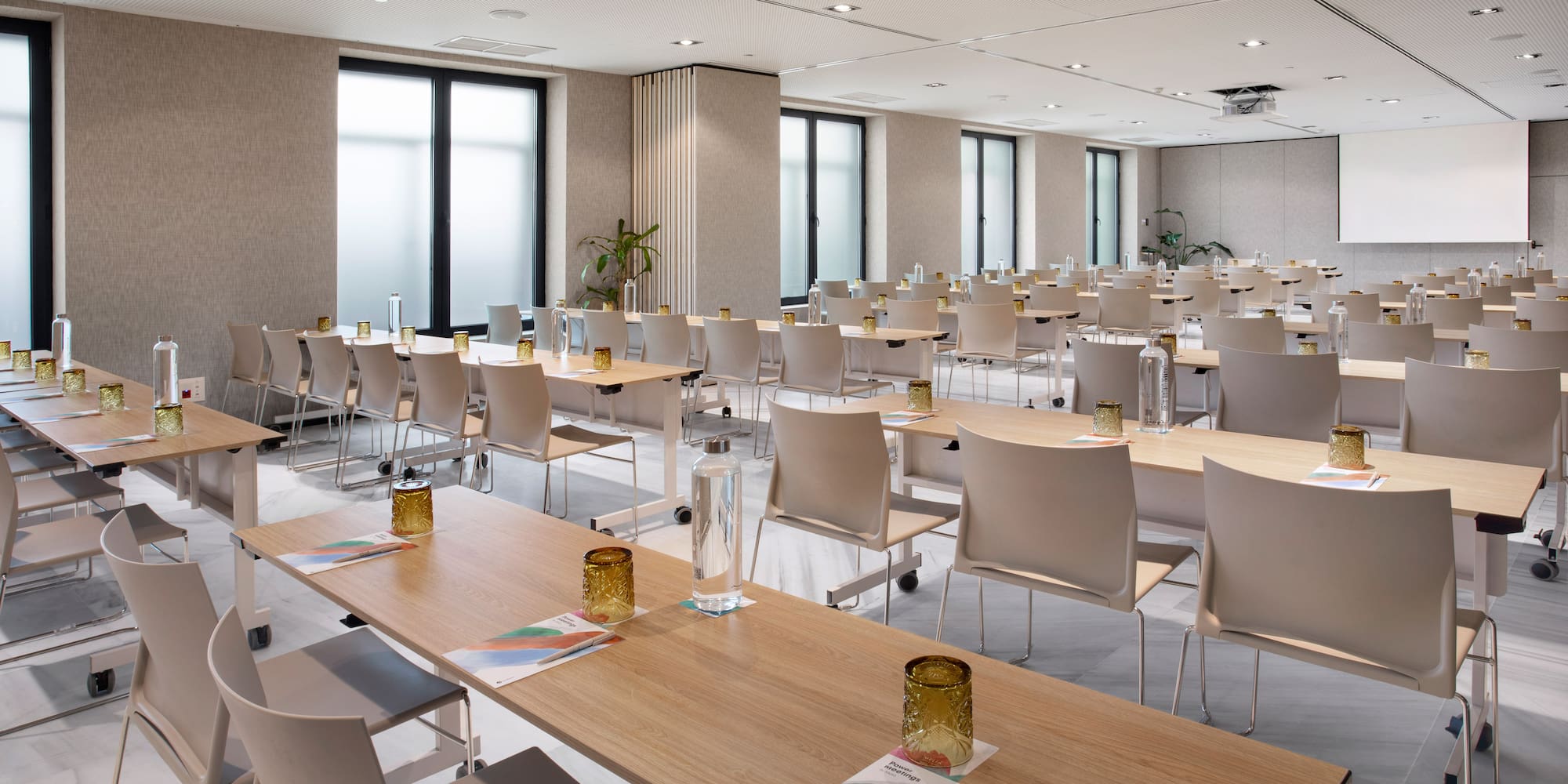 a room with tables and chairs