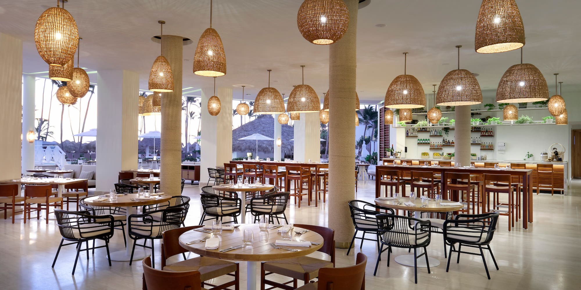 a restaurant with tables and chairs