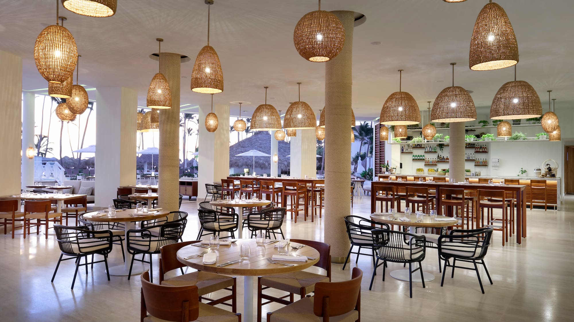 a restaurant with tables and chairs