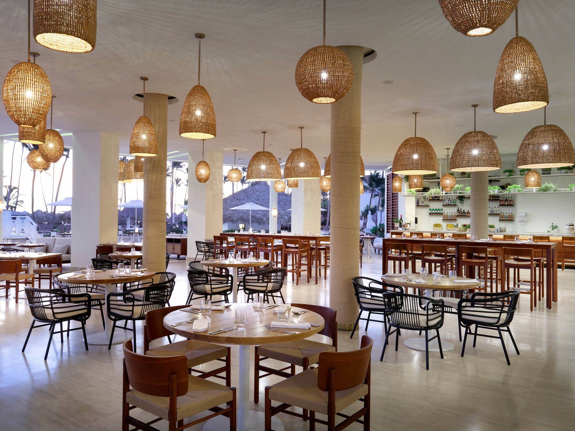 a restaurant with tables and chairs