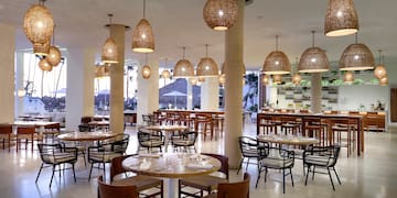 a restaurant with tables and chairs