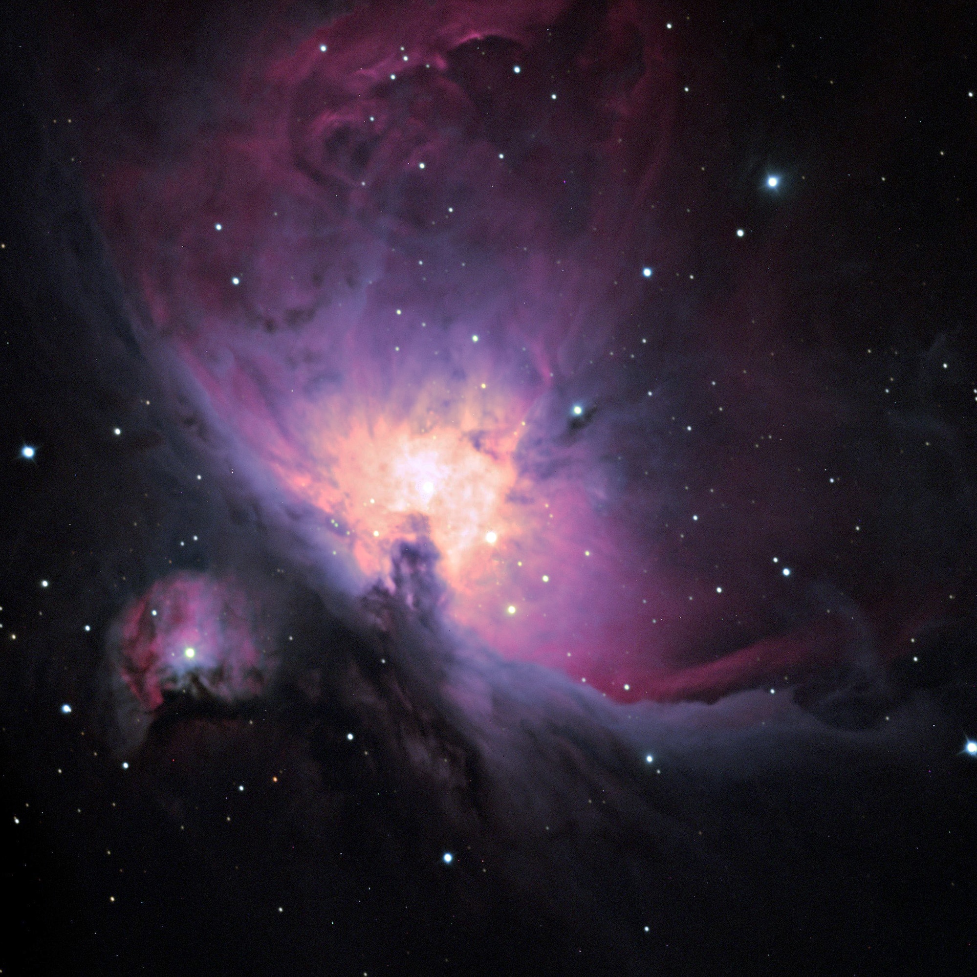 a purple and pink nebula in space