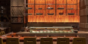 a restaurant with a glass display