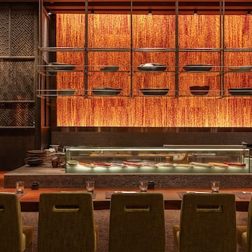 a restaurant with a glass display