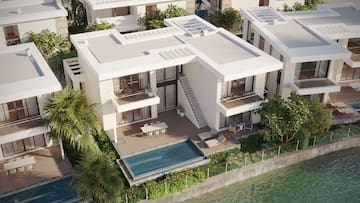 a building with a pool in the middle of it