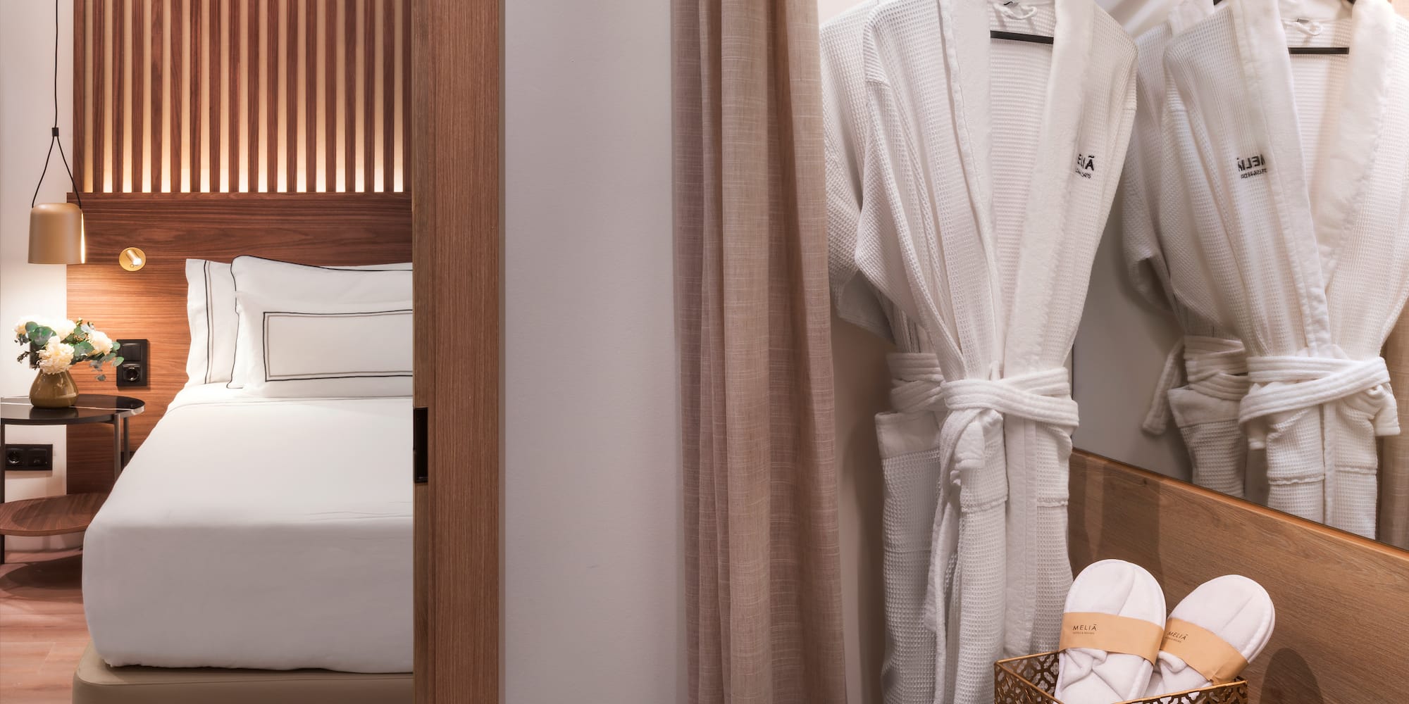 a white robe on a swinger in a hotel room