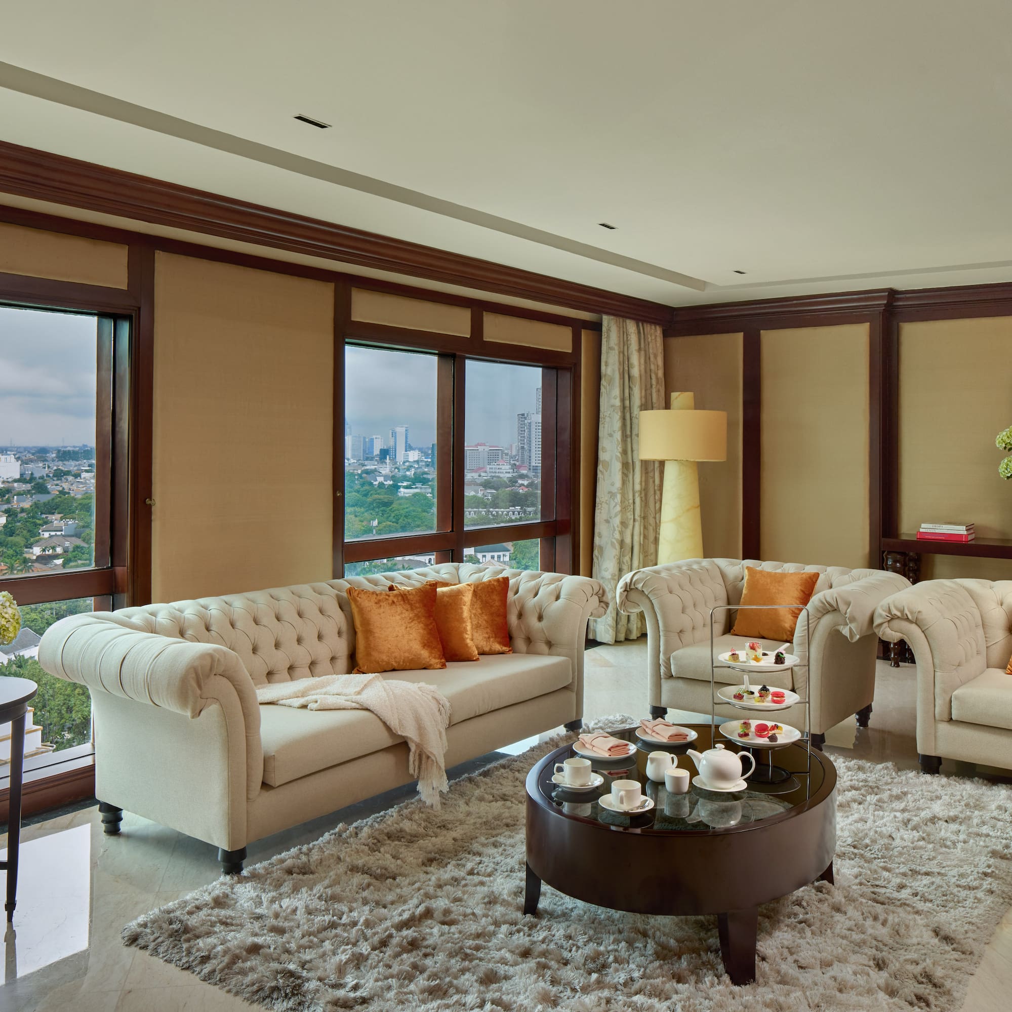 a living room with couches and coffee table