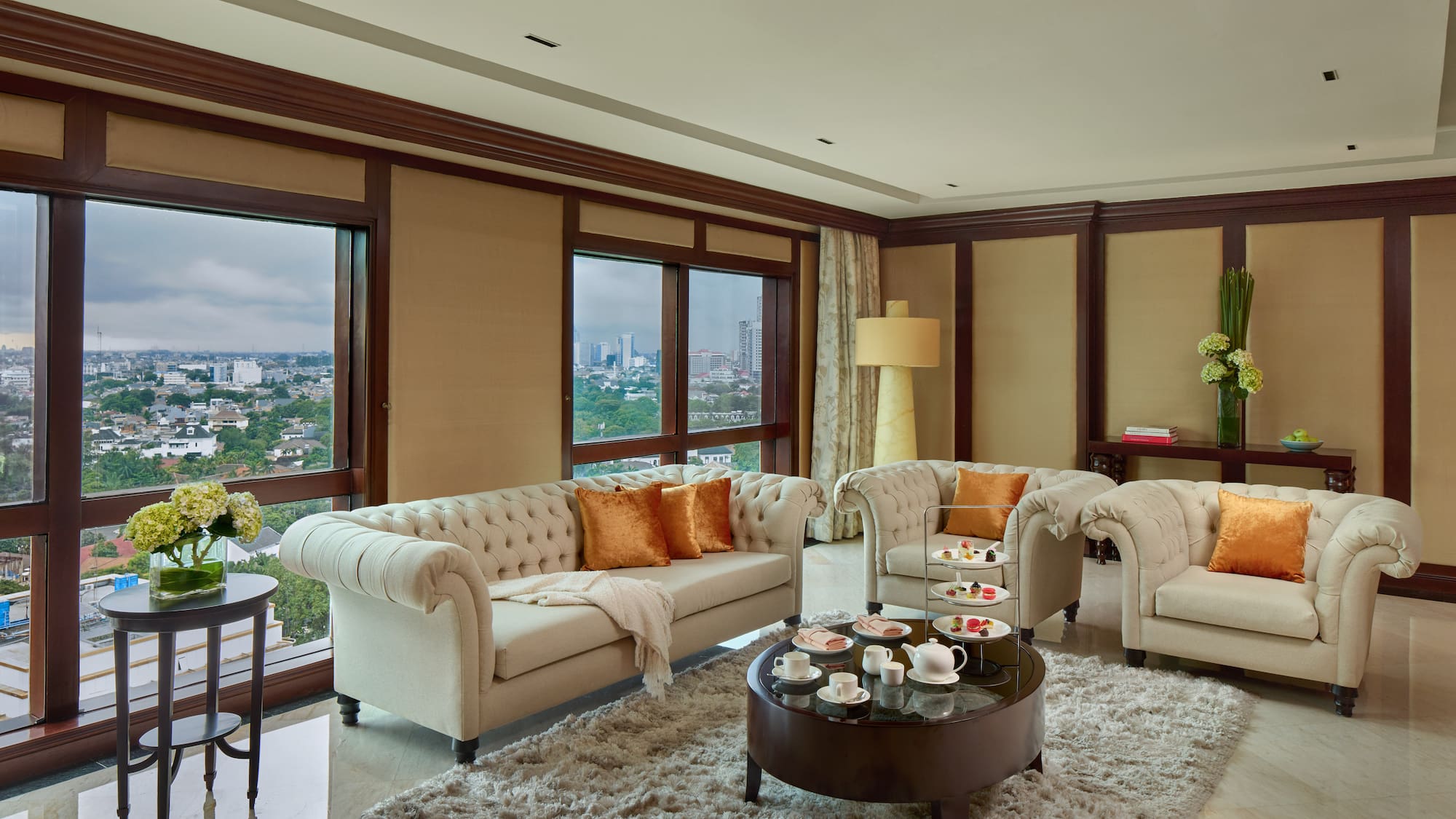 a living room with couches and coffee table