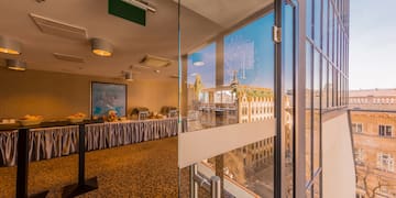 a glass door with a table and a tablecloth