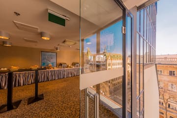 a glass door with a table and a tablecloth