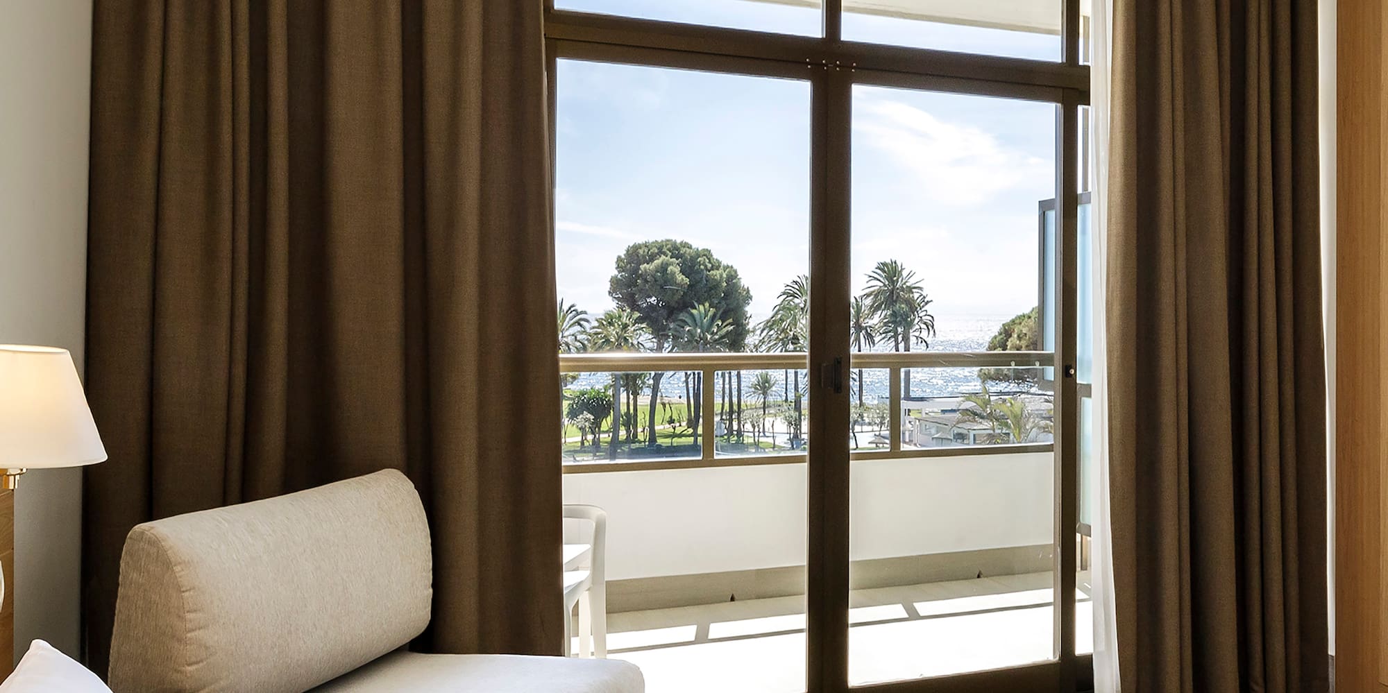 a room with a bed and a chair