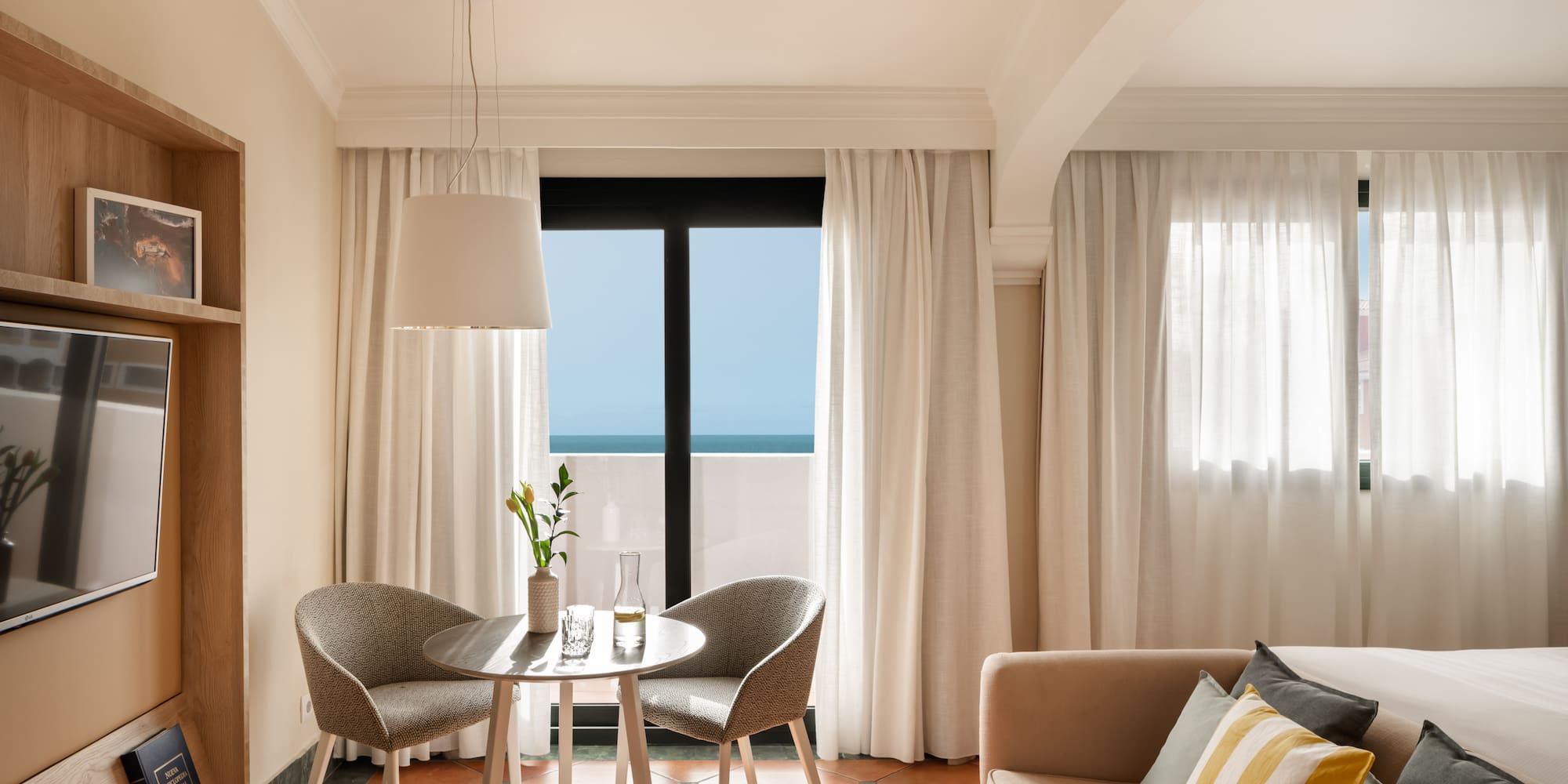 a room with a table and chairs