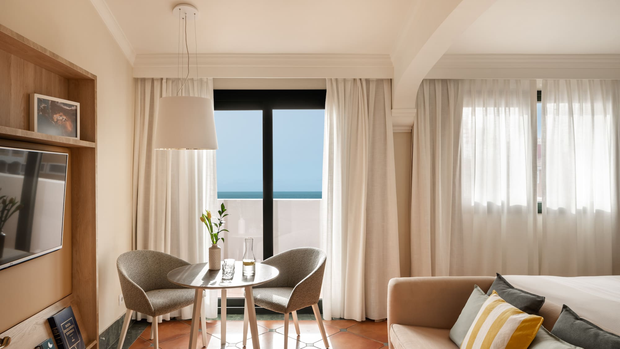 a room with a table and chairs