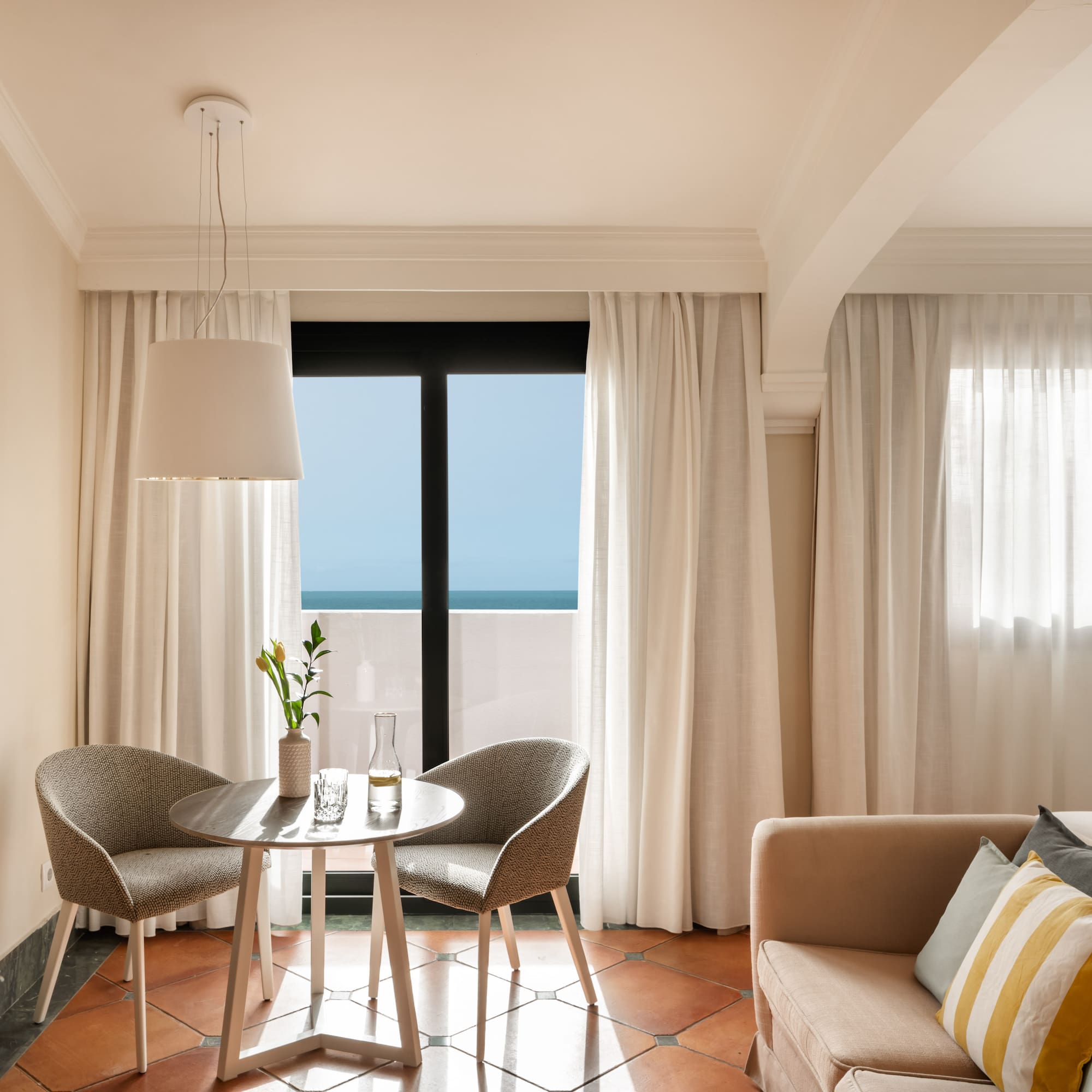 a room with a table and chairs