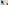 a bed with blue pillows and a blue curtain