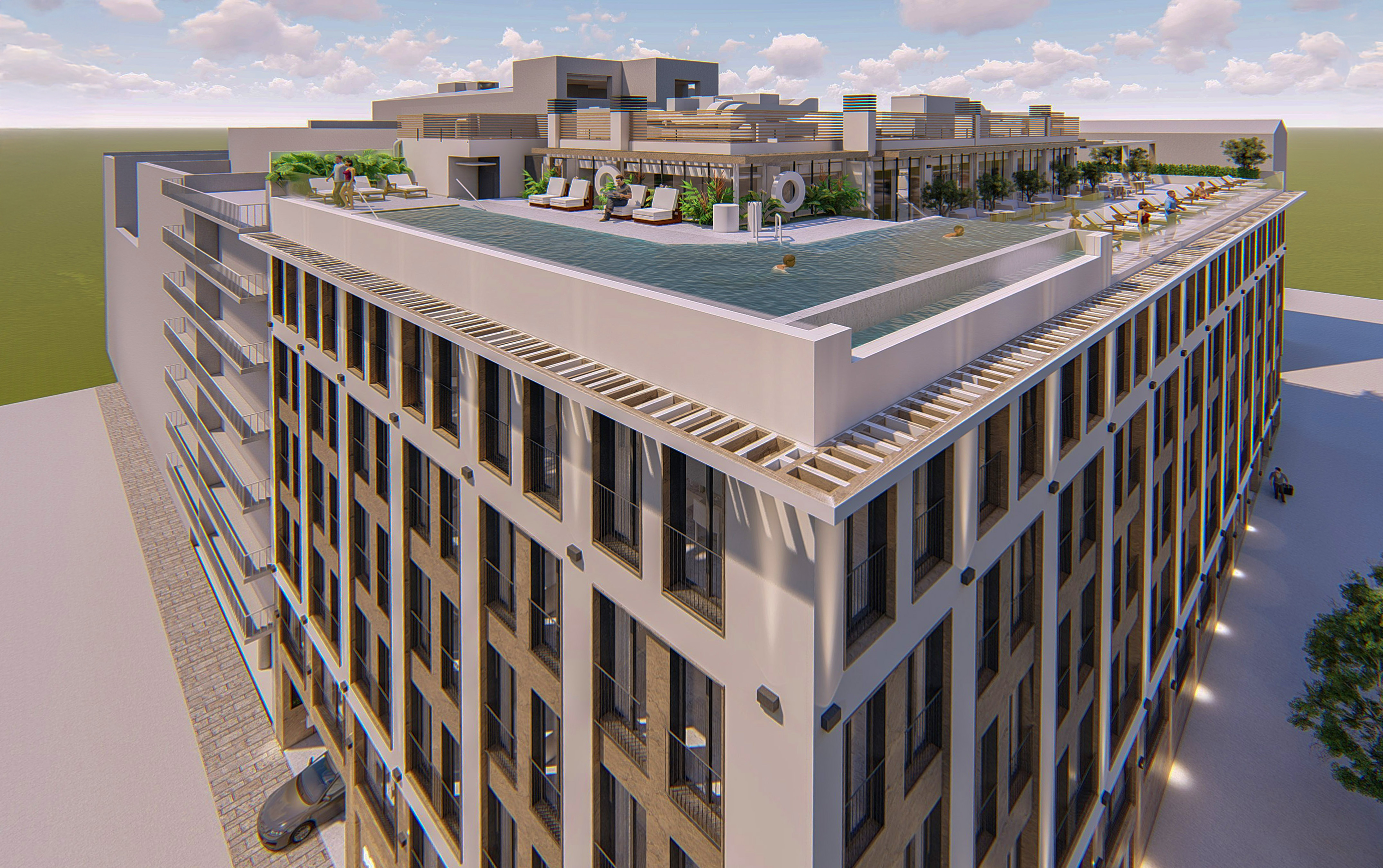 a pool with a building and a stone wall