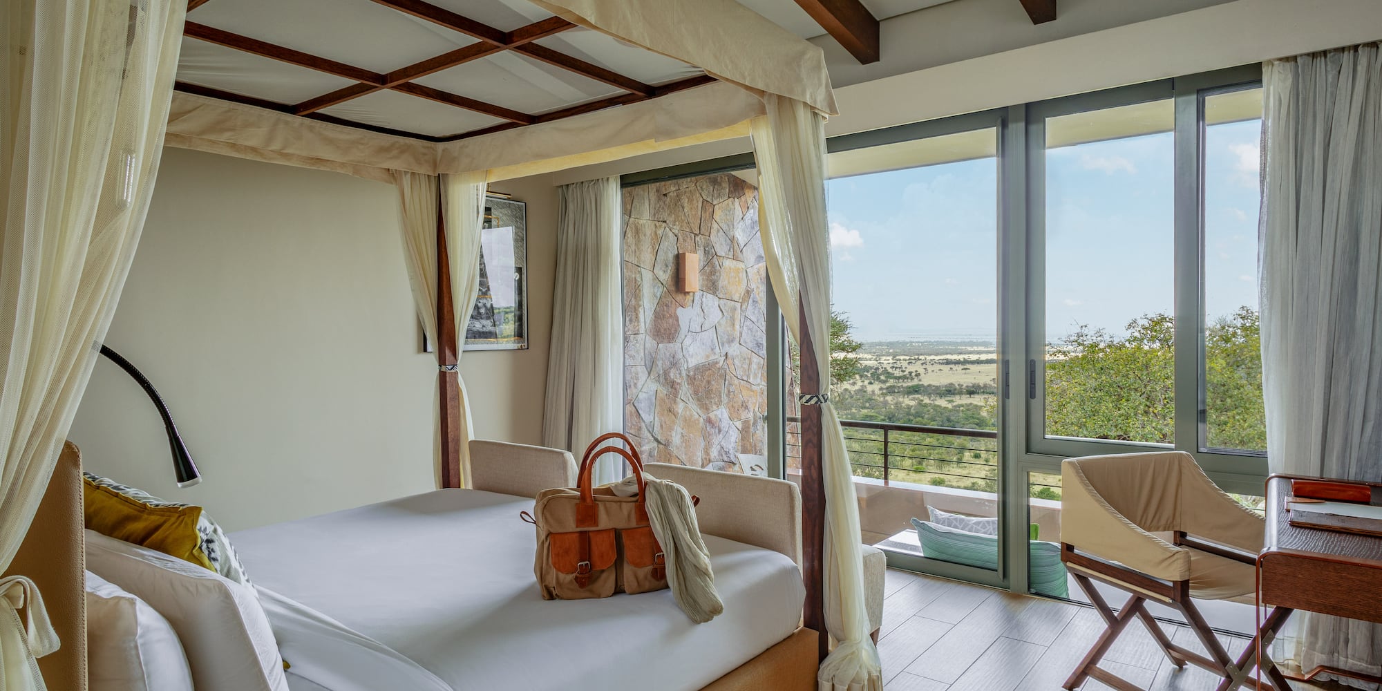 a room with a bed and a chair