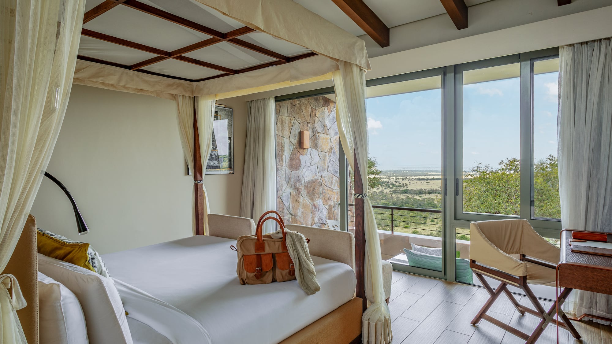 a room with a bed and a chair