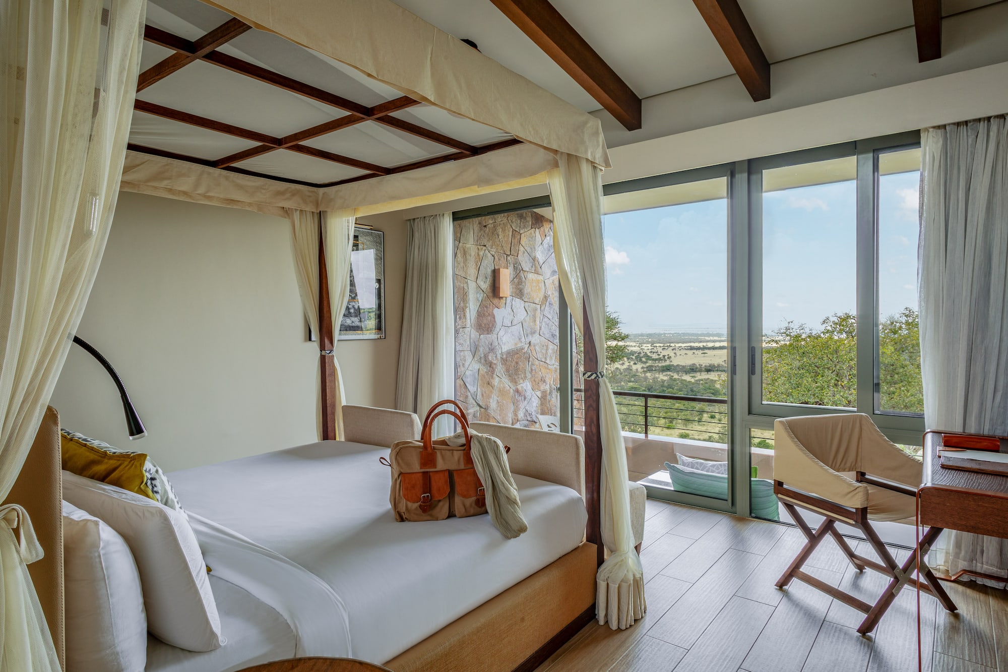 a room with a bed and a chair