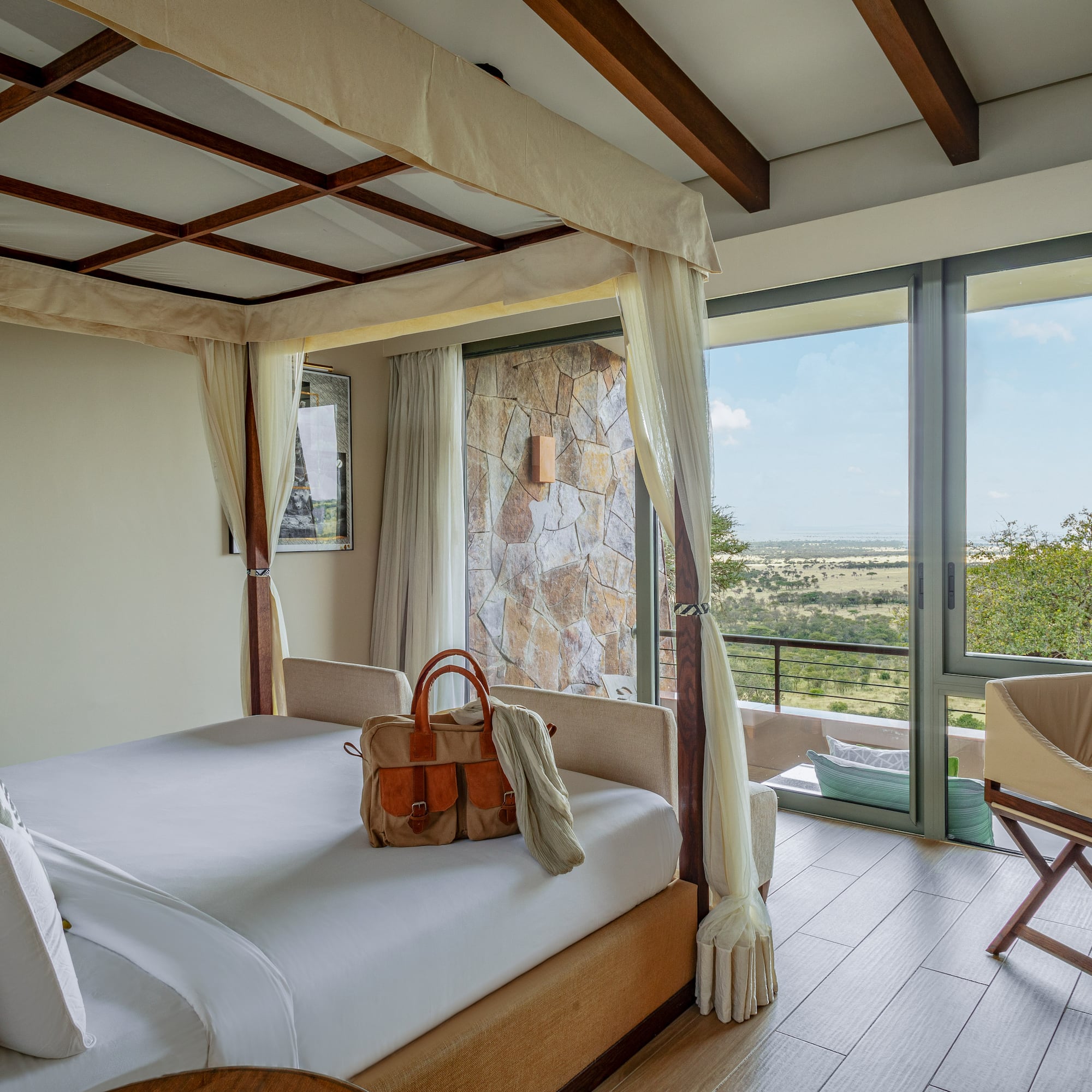 a room with a bed and a chair