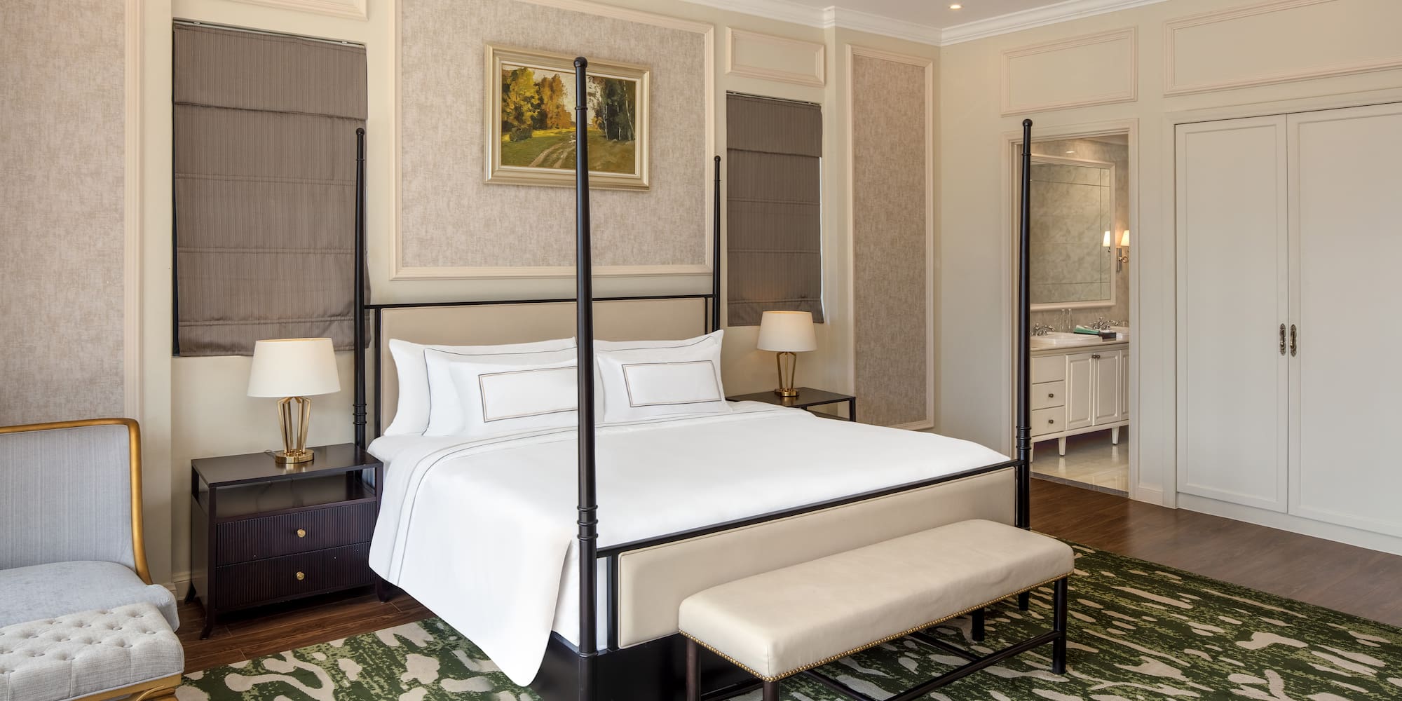 a bed with a four post bed