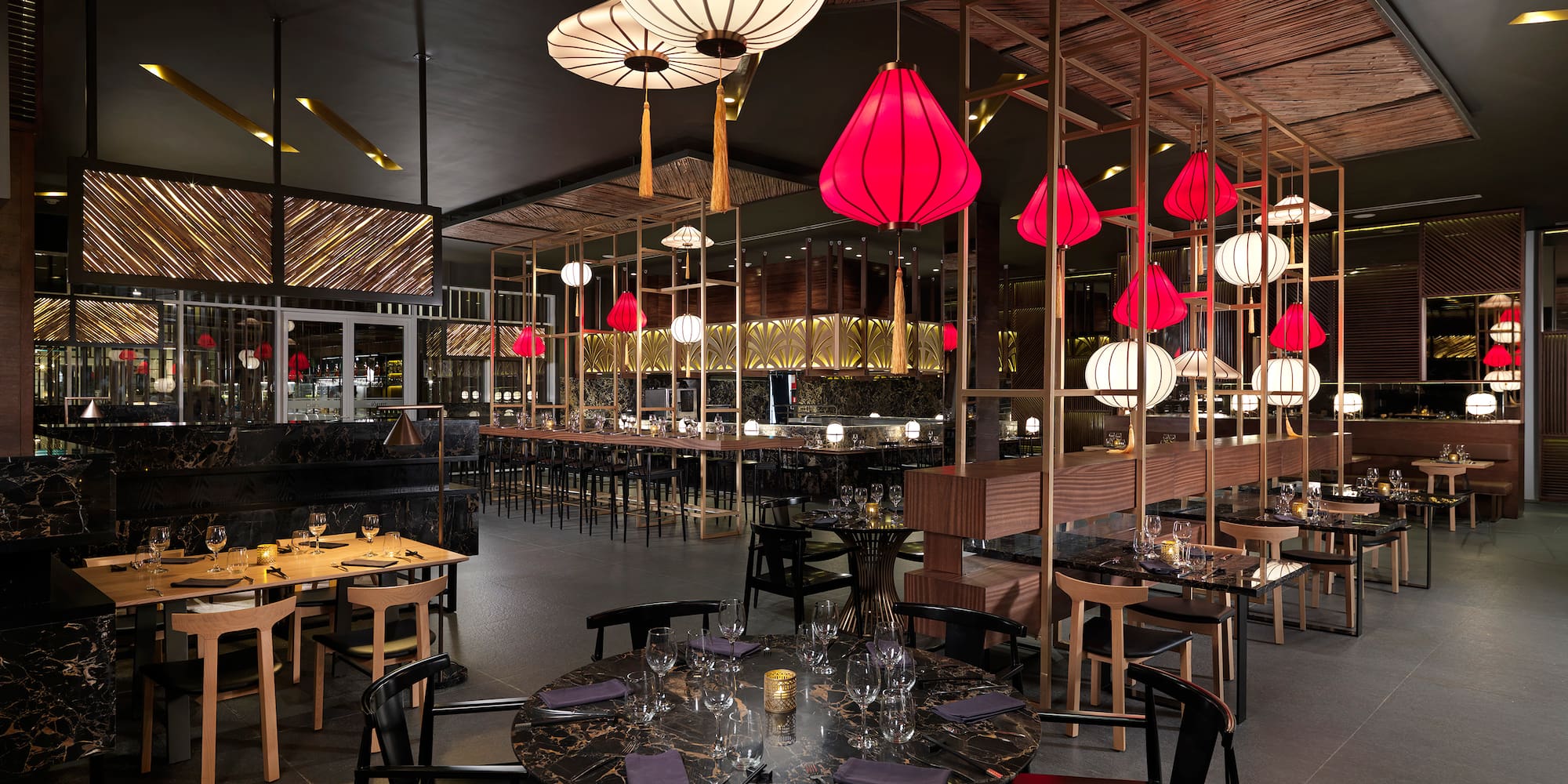 a restaurant with tables and chairs