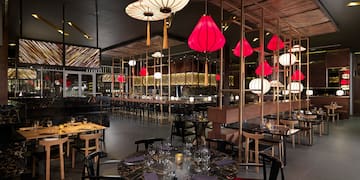 a restaurant with tables and chairs