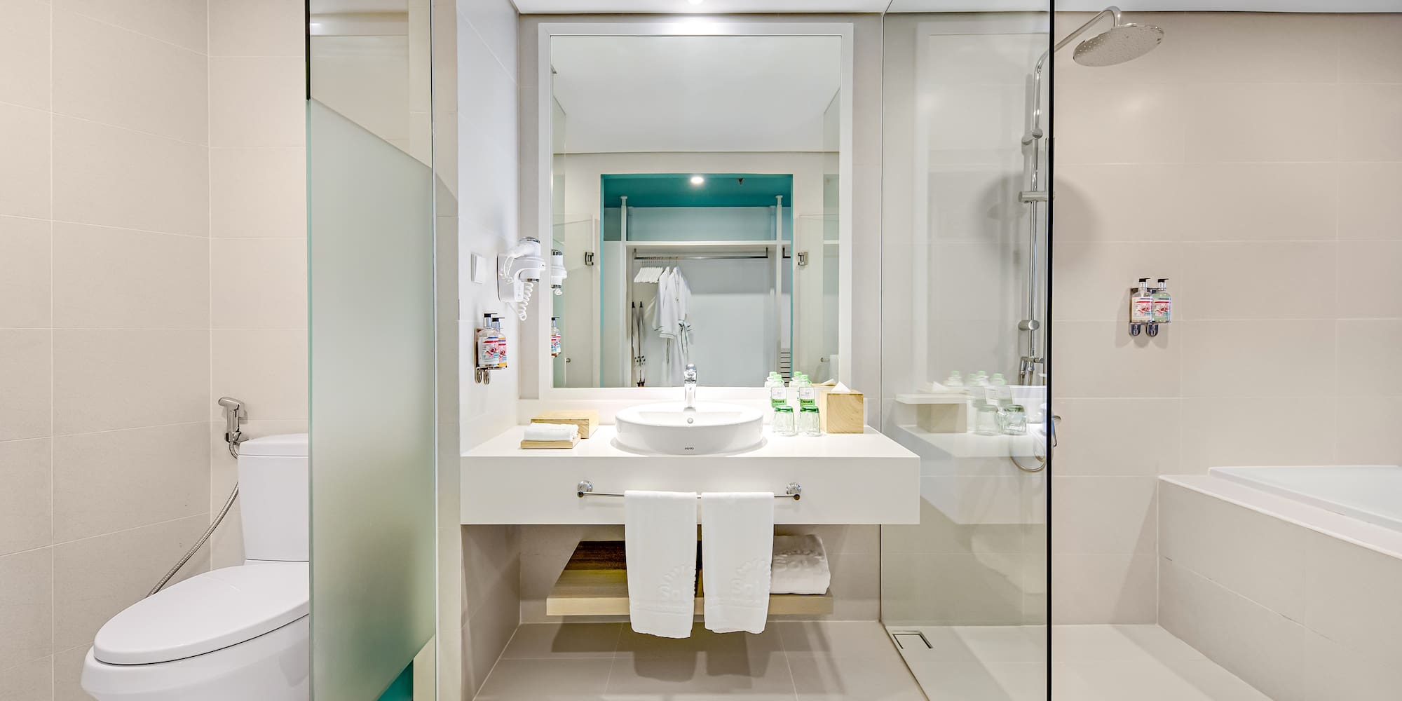 a bathroom with a sink and toilet