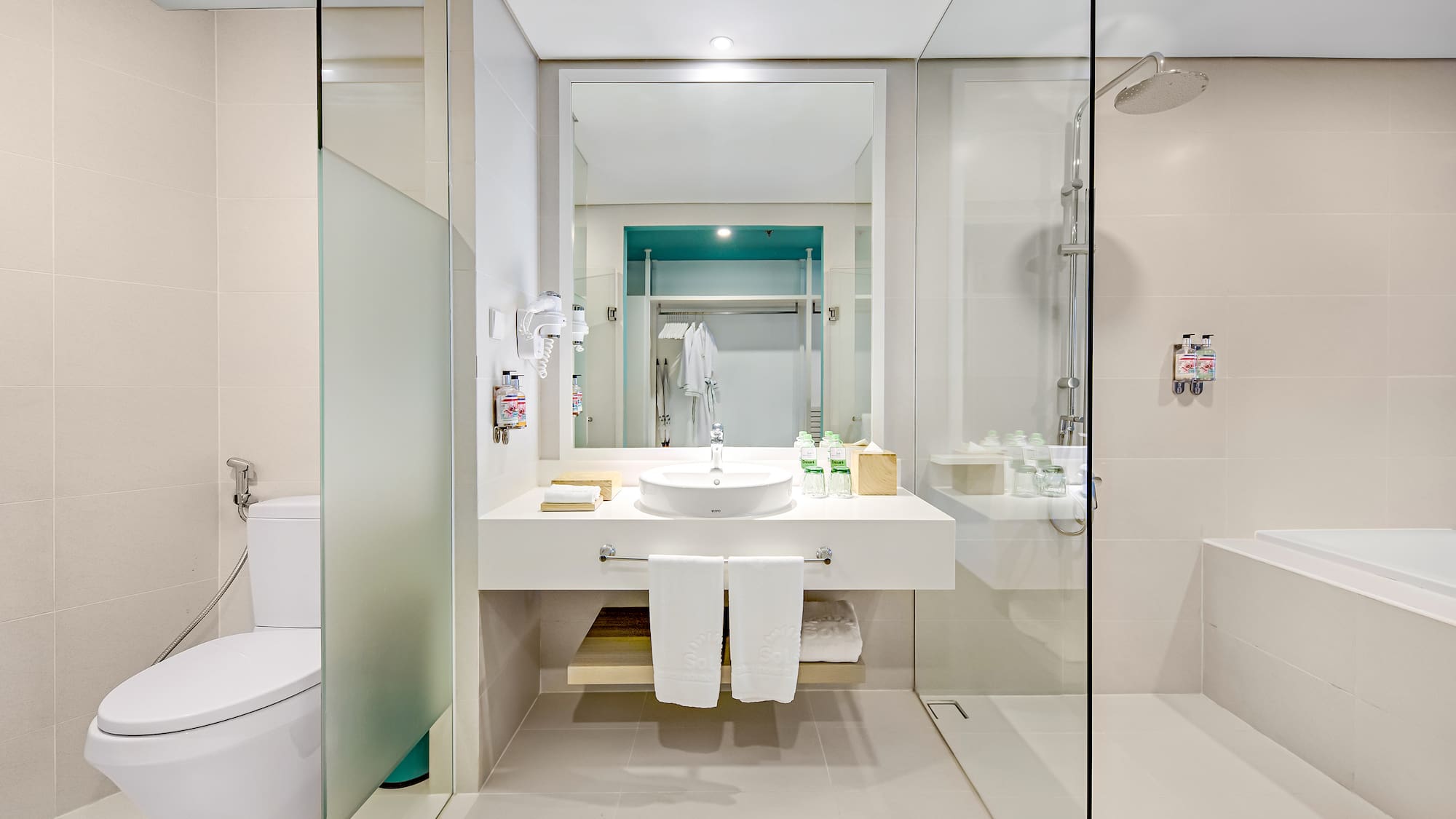 a bathroom with a sink and toilet