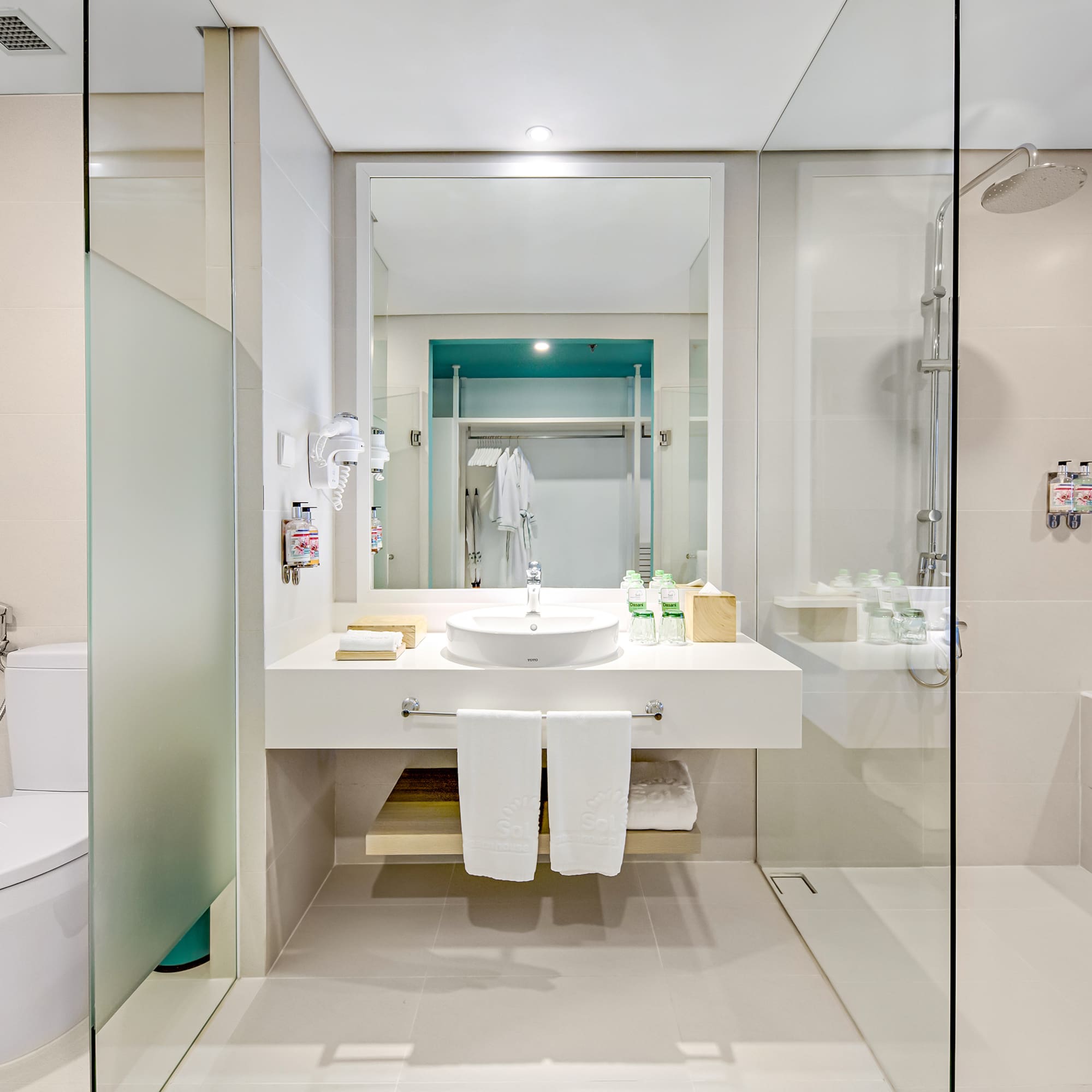 a bathroom with a sink and toilet