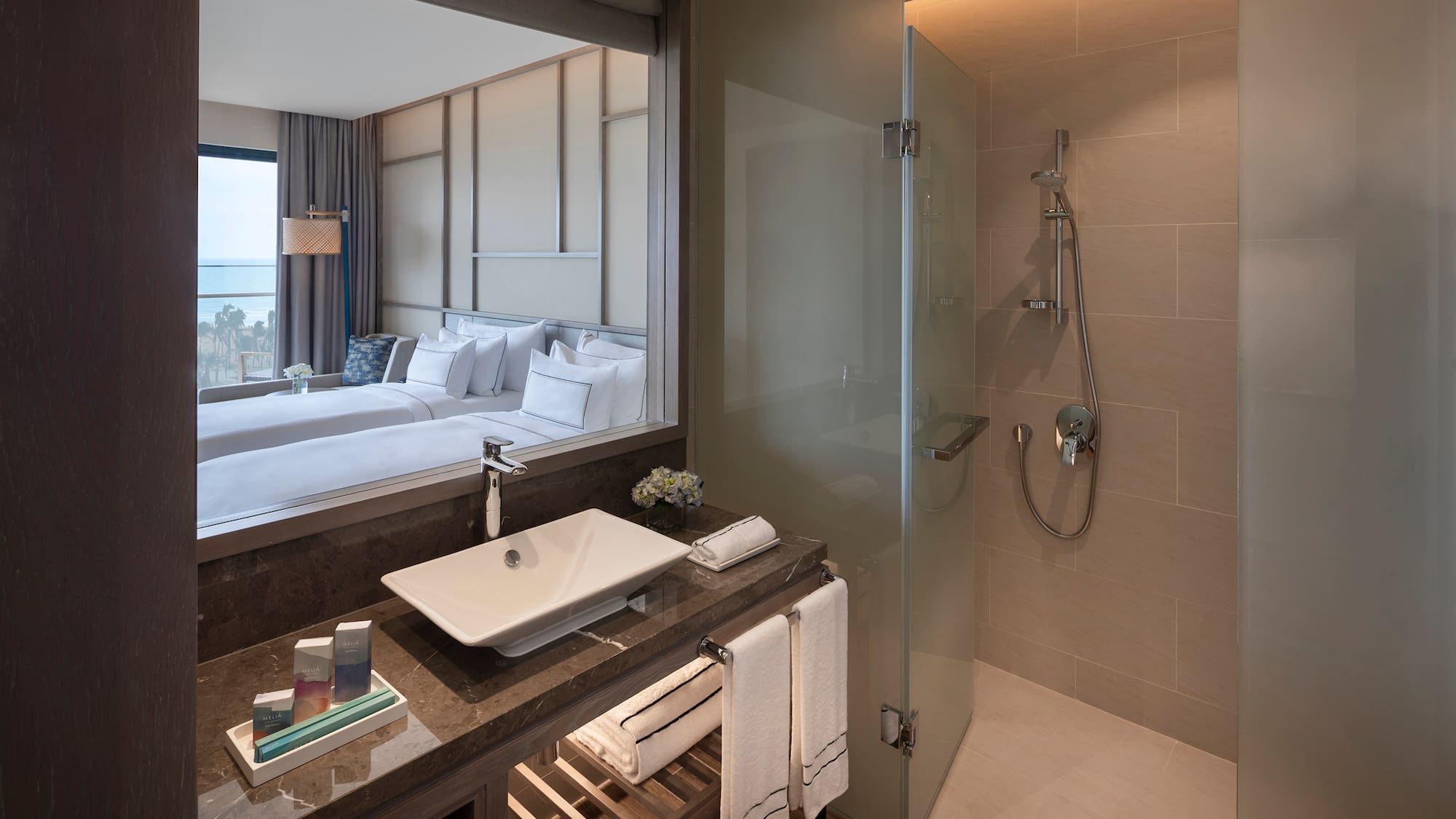 a bathroom with a mirror and a sink