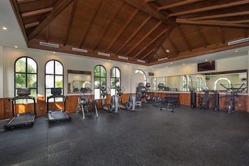 a large gym with exercise equipment