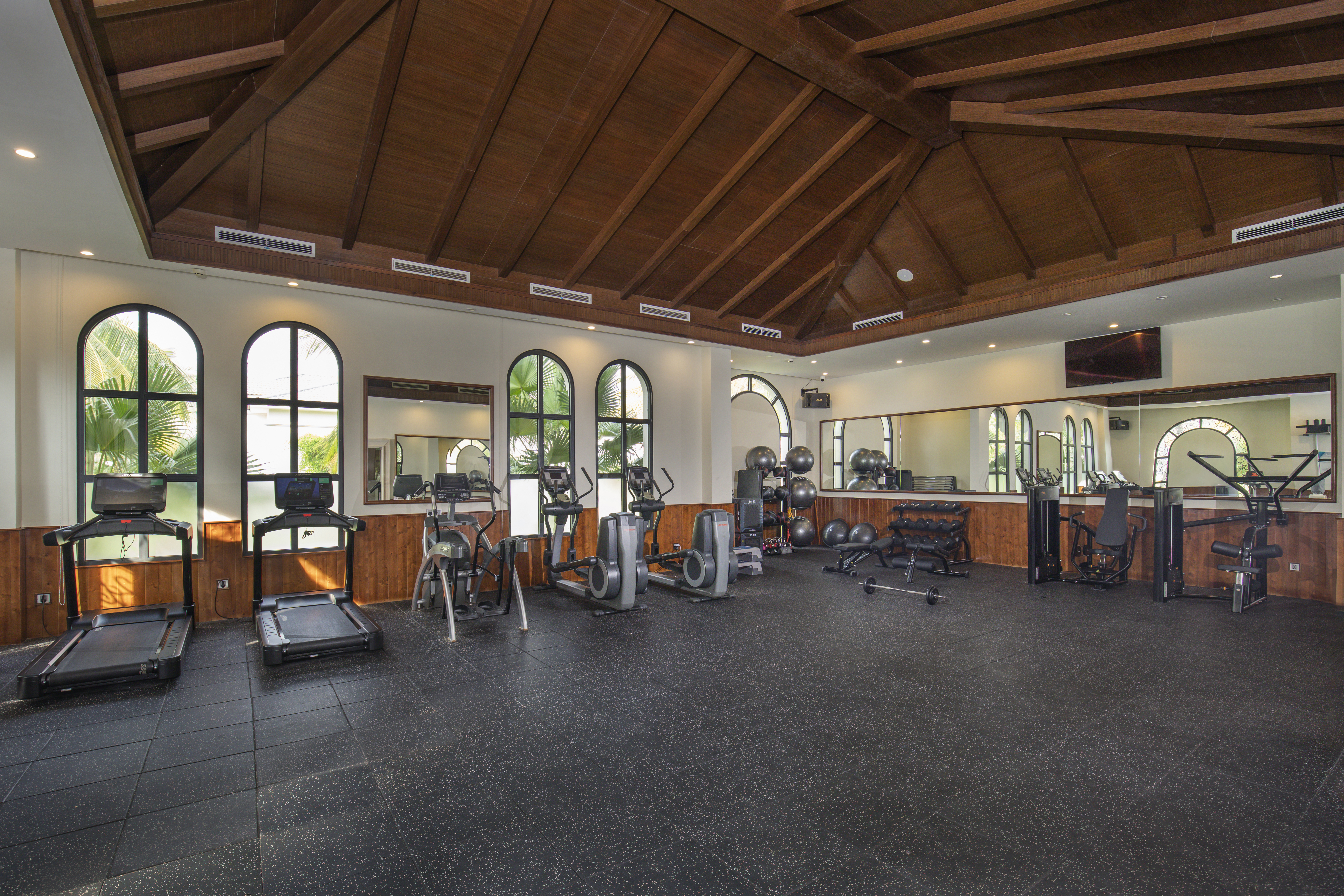 a large gym with exercise equipment