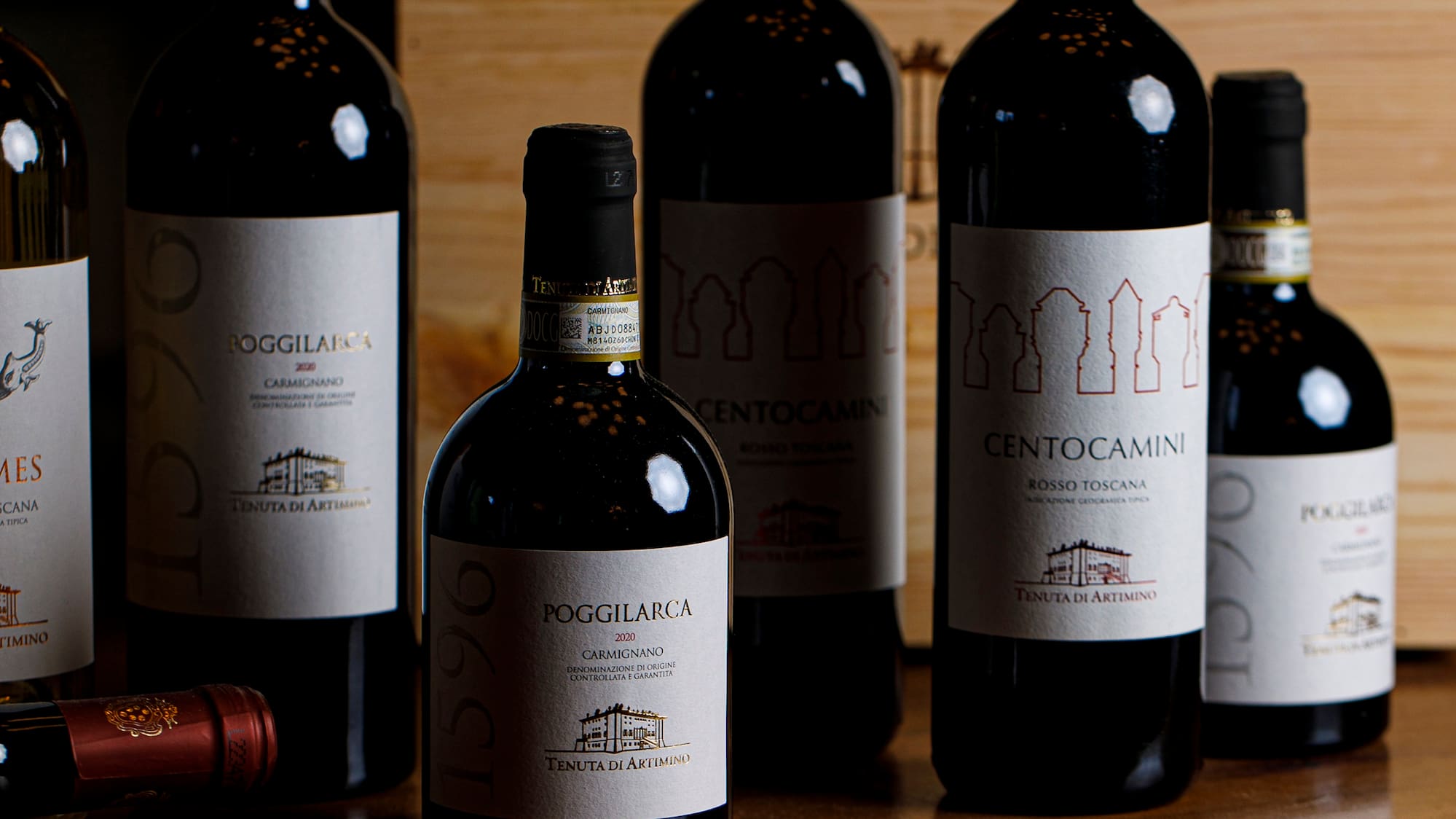 a group of wine bottles on a table