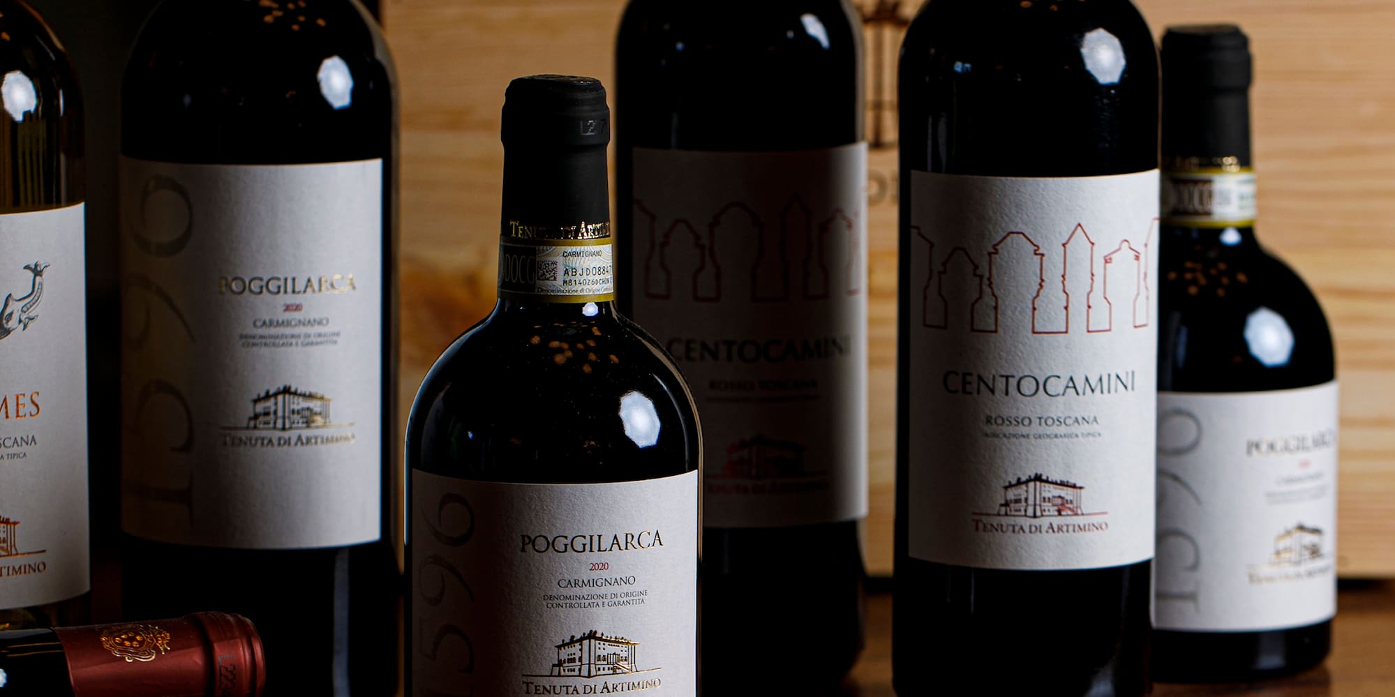 a group of wine bottles on a table