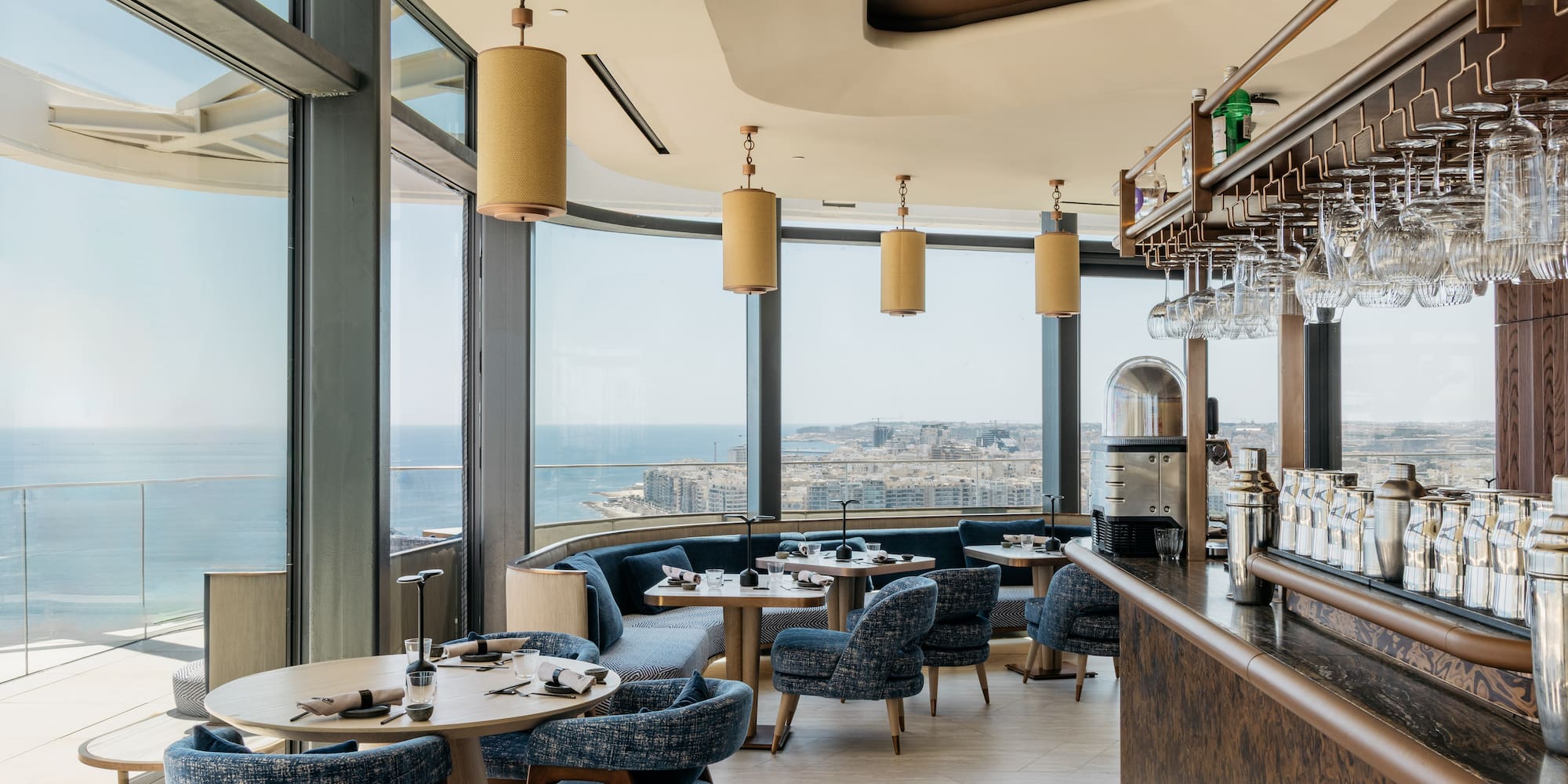 a restaurant with a view of the ocean