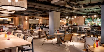 a room with tables and chairs