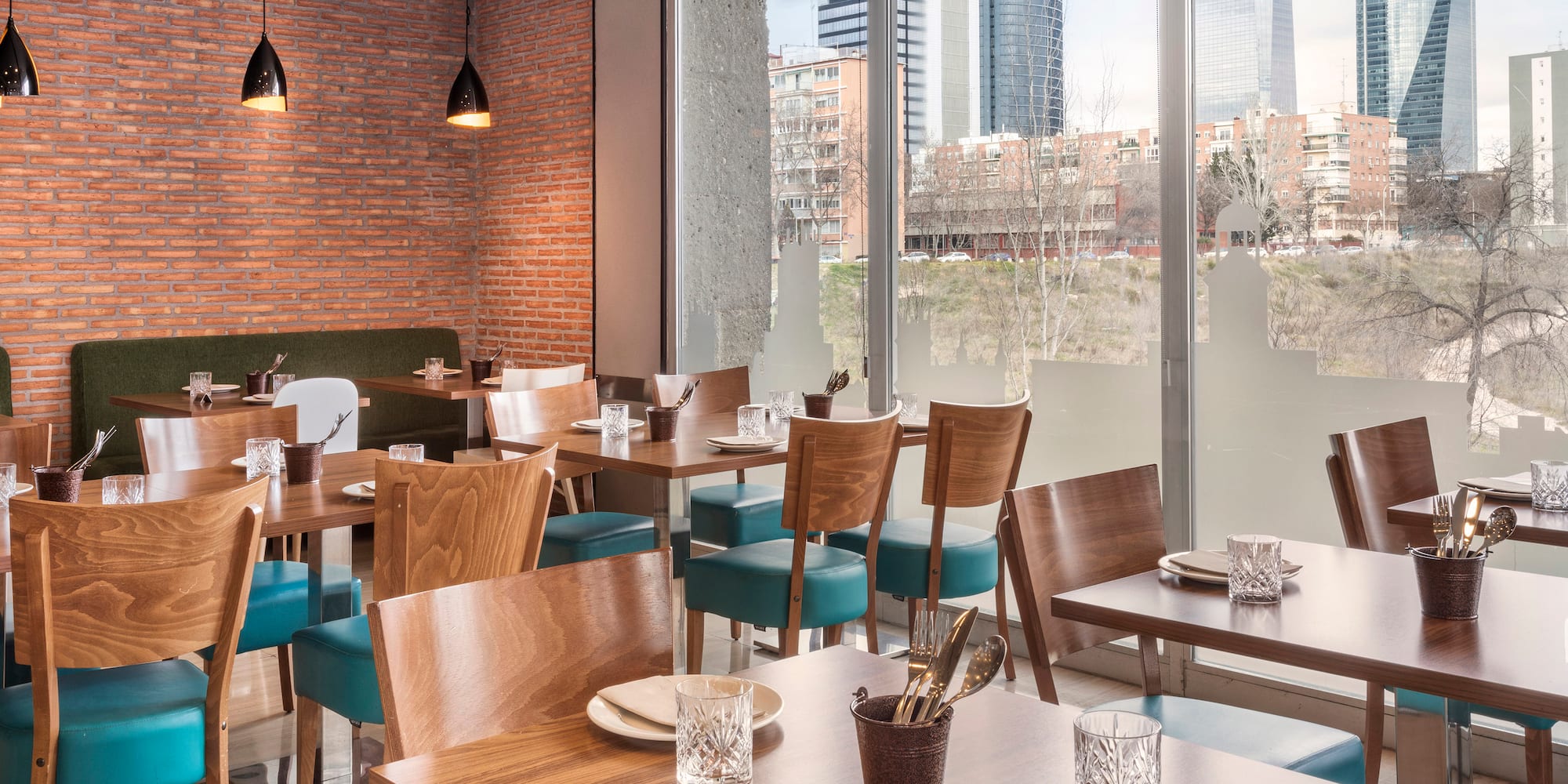 a restaurant with tables and chairs