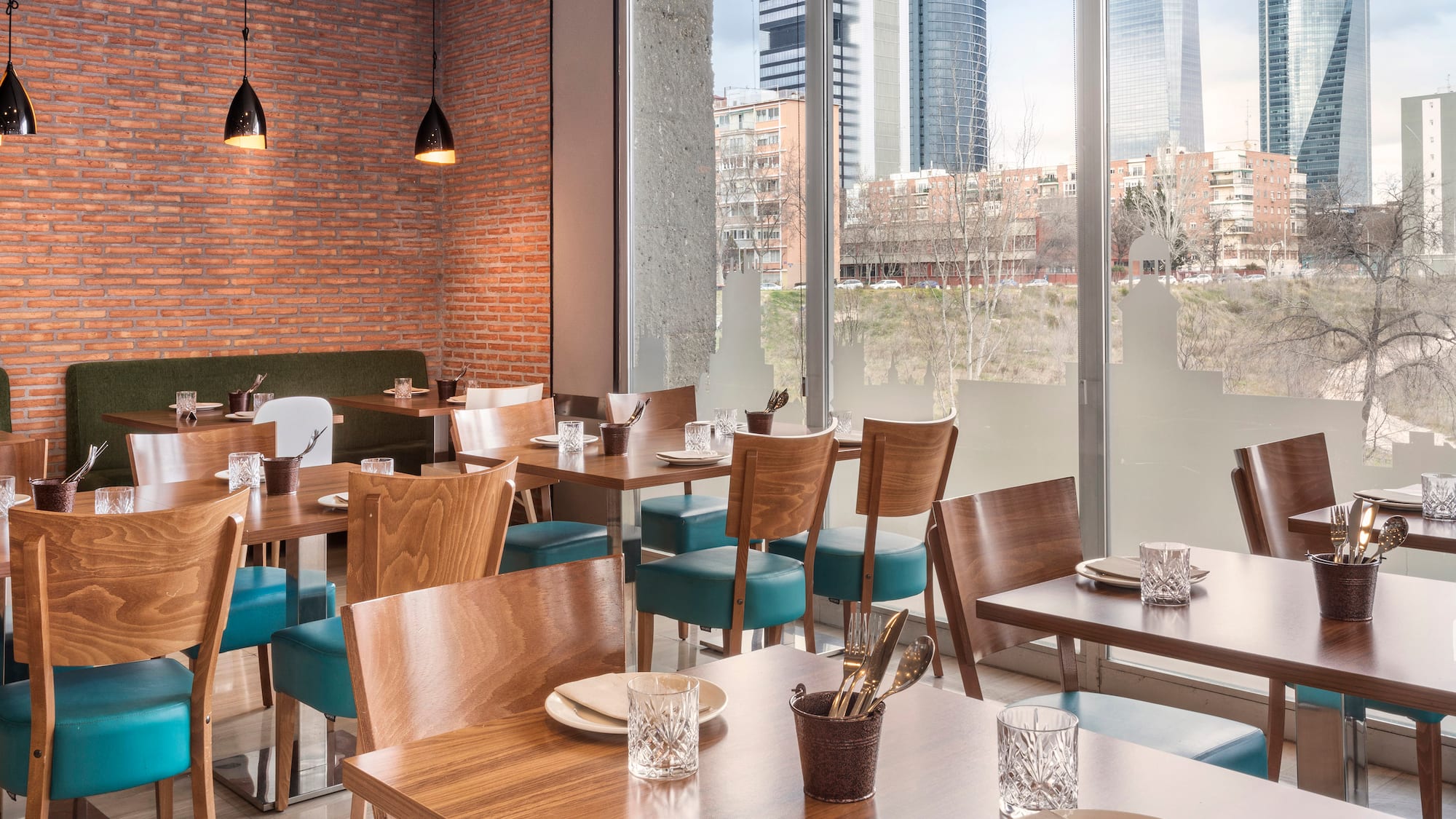 a restaurant with tables and chairs