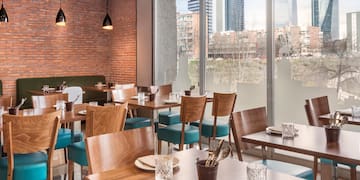 a restaurant with tables and chairs