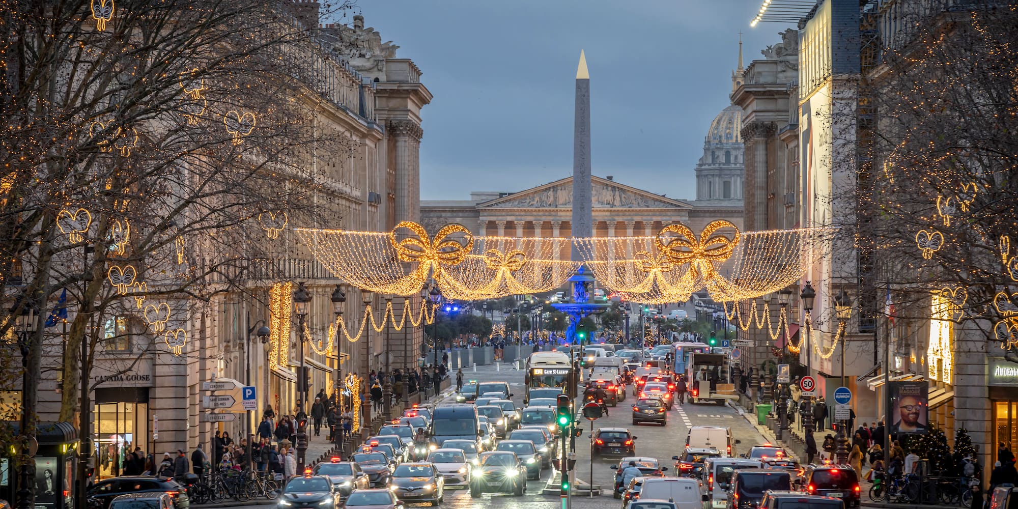 a street with cars and lights