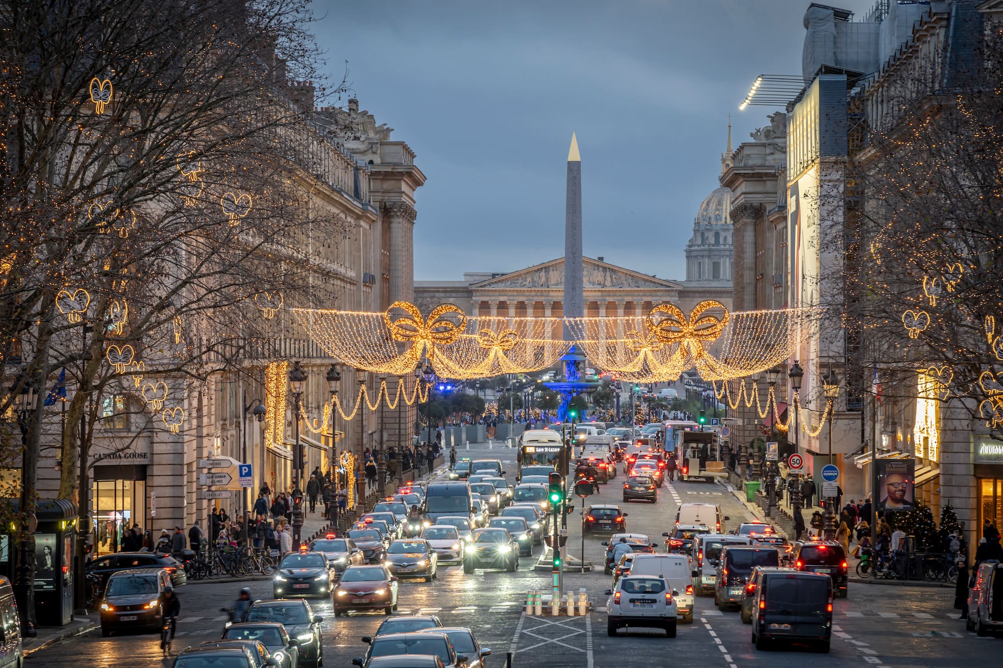 a street with cars and lights