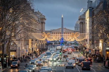 a street with cars and lights