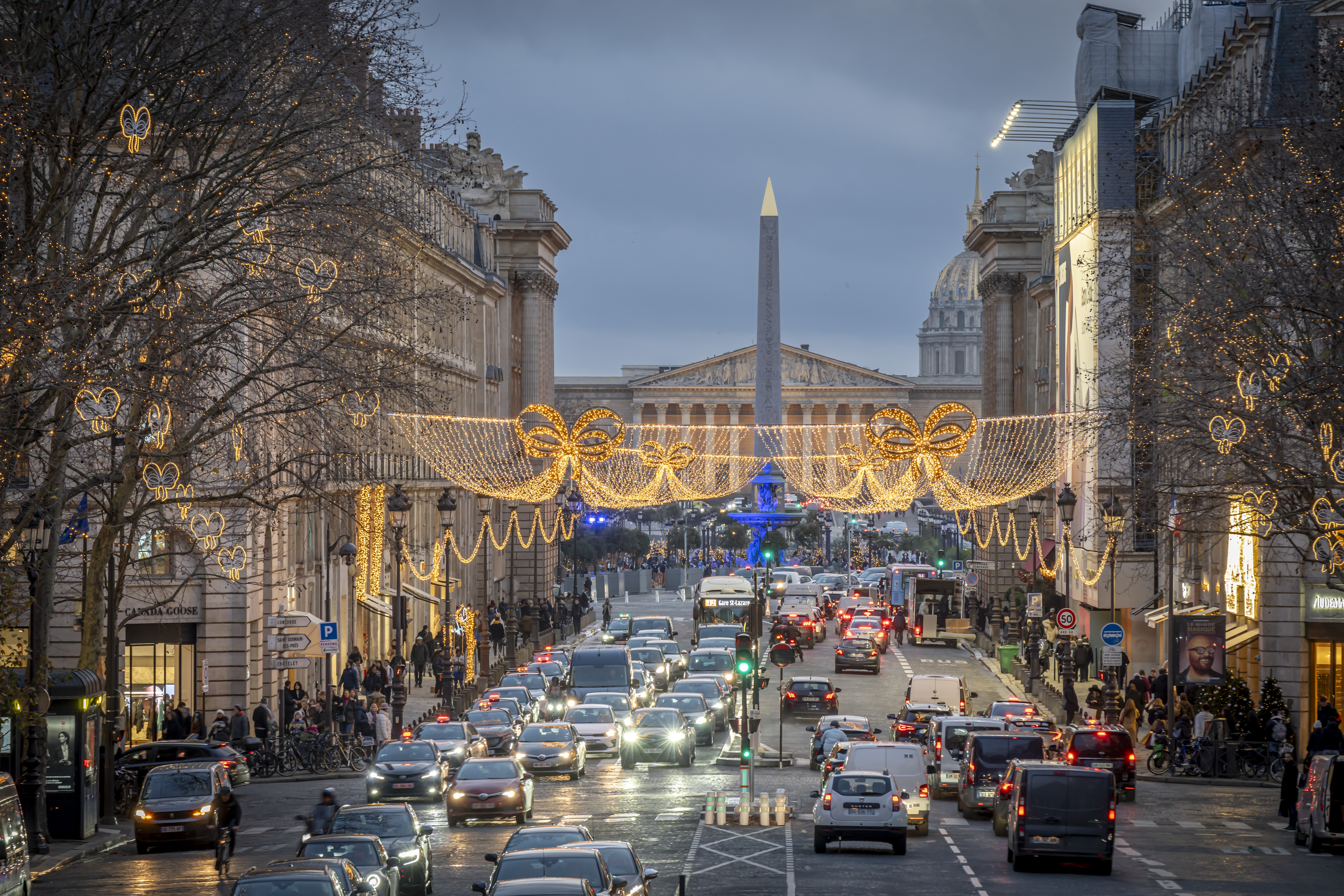 a street with cars and lights