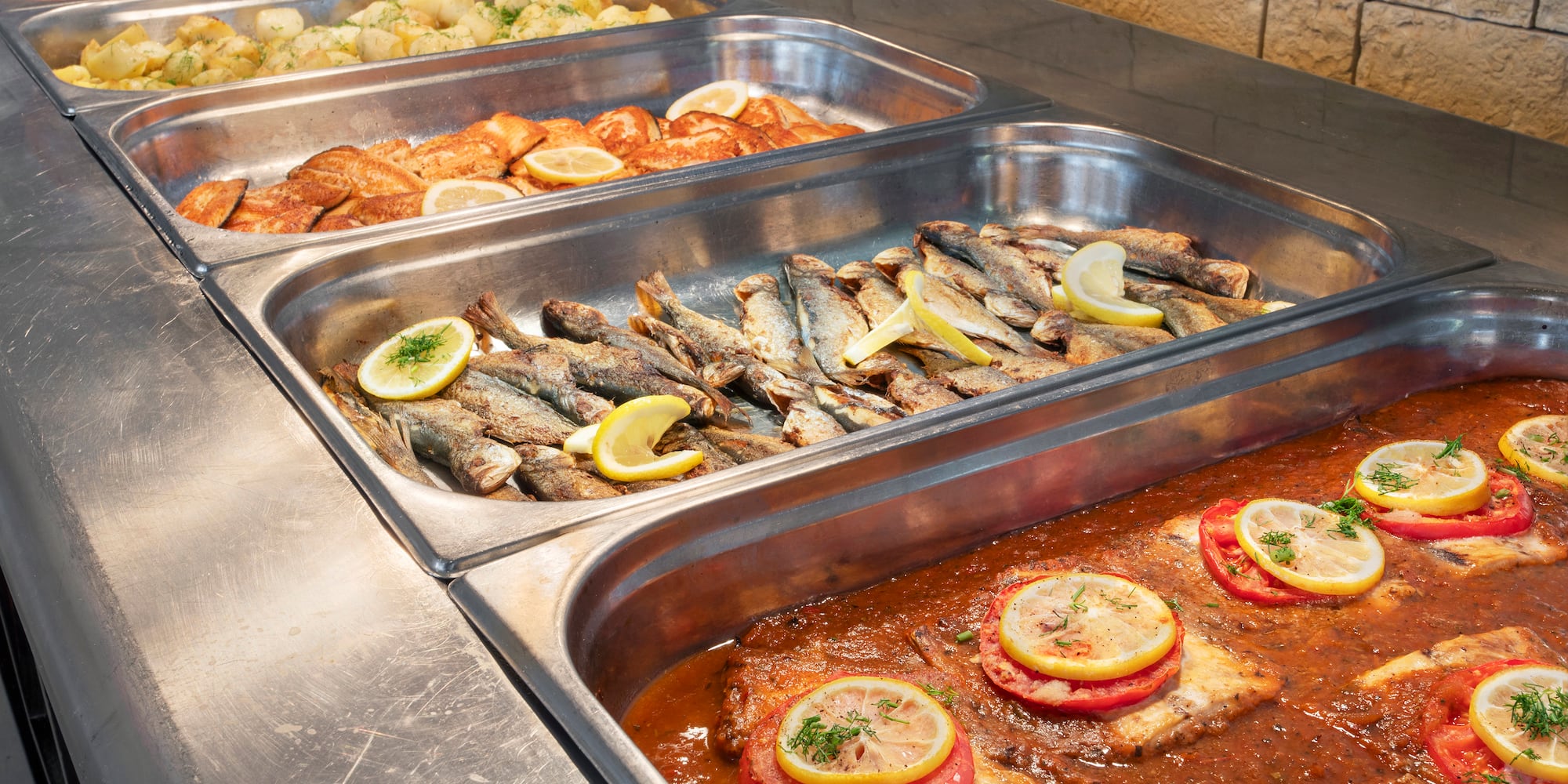 a trays of food in a restaurant