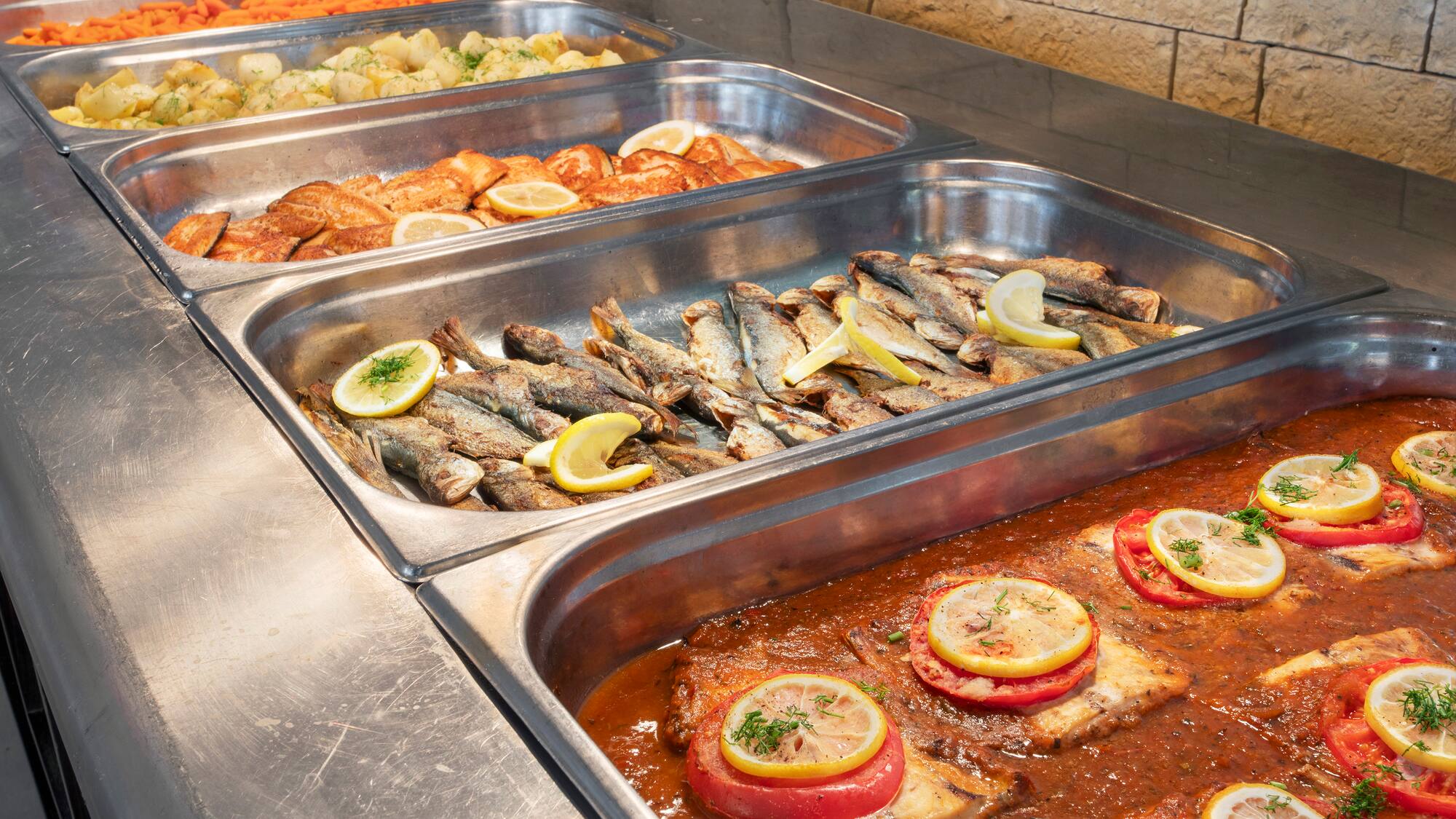 a trays of food in a restaurant